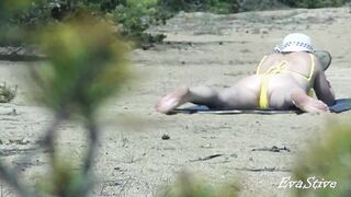 Mom undresses on the beach thinking that no one sees her